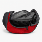 Sac bandoulière Le Baladin rouge ouvert, doublure intérieure et cordon de serrage visibles — maille respirante pour petit chien