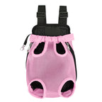 Sac de transport L'Éclaireur rose présenté à plat, vue de face : quatre ouvertures pour les pattes, bretelles réglables rembourrées et maille respirante rose